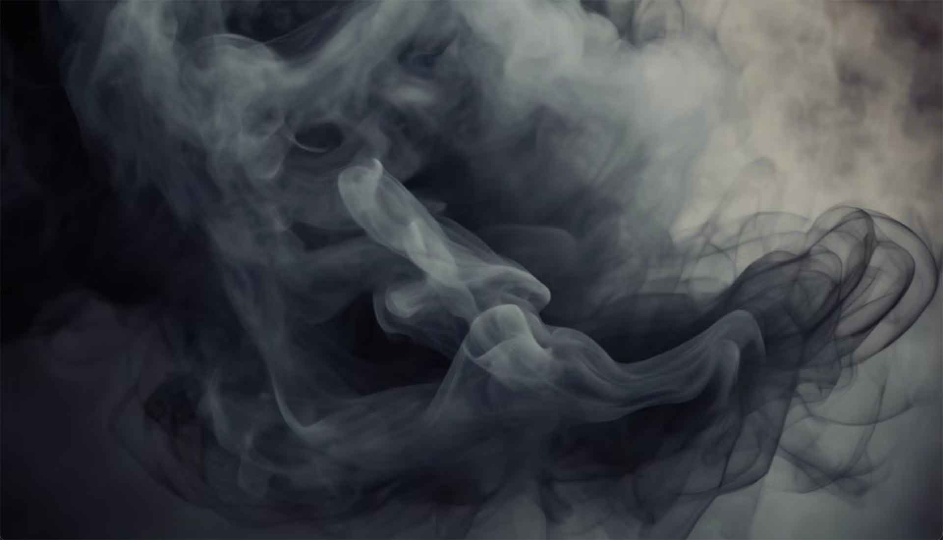 # Alt Text

Dense white and gray smoke swirling against a dark background